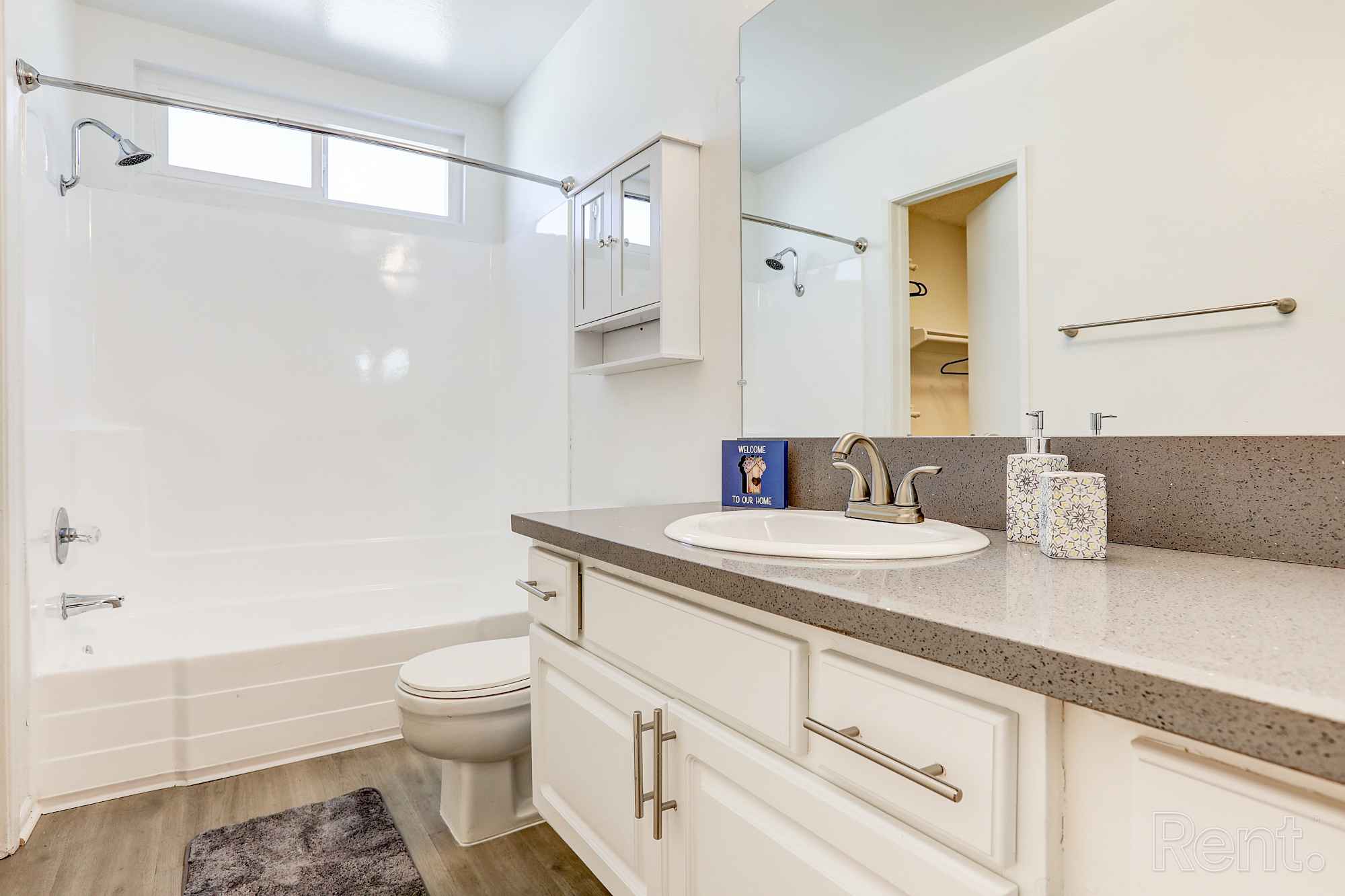 bathroom sink and shower tub floorplan e at Chateau de Ville