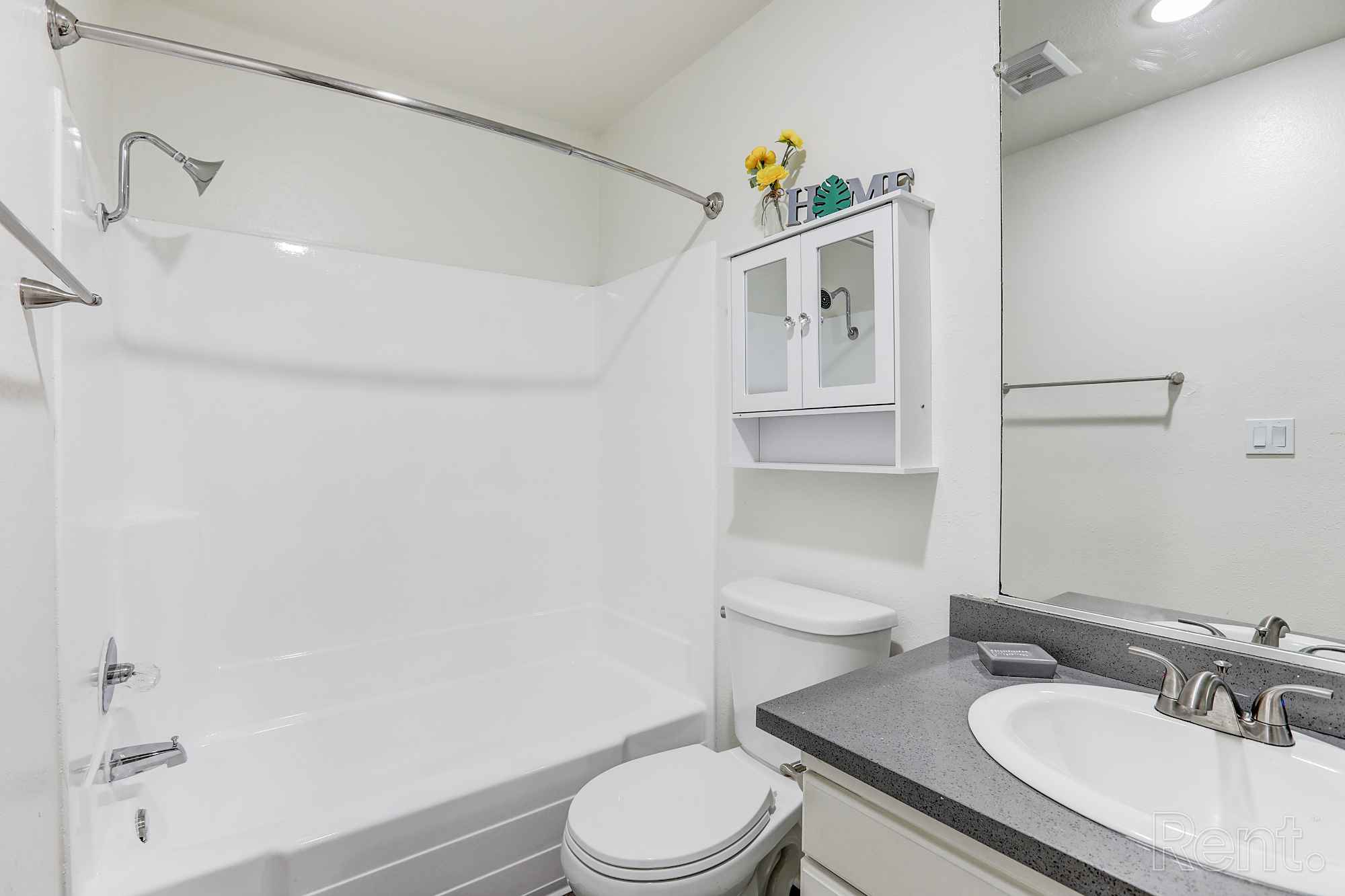 bathroom sink and shower tub floorplan j at Chateau de Ville